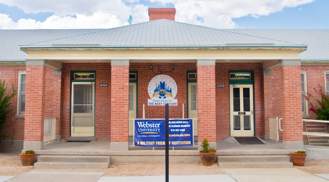 Outside front of the attractive brick education building on the base at Fort Bliss. 