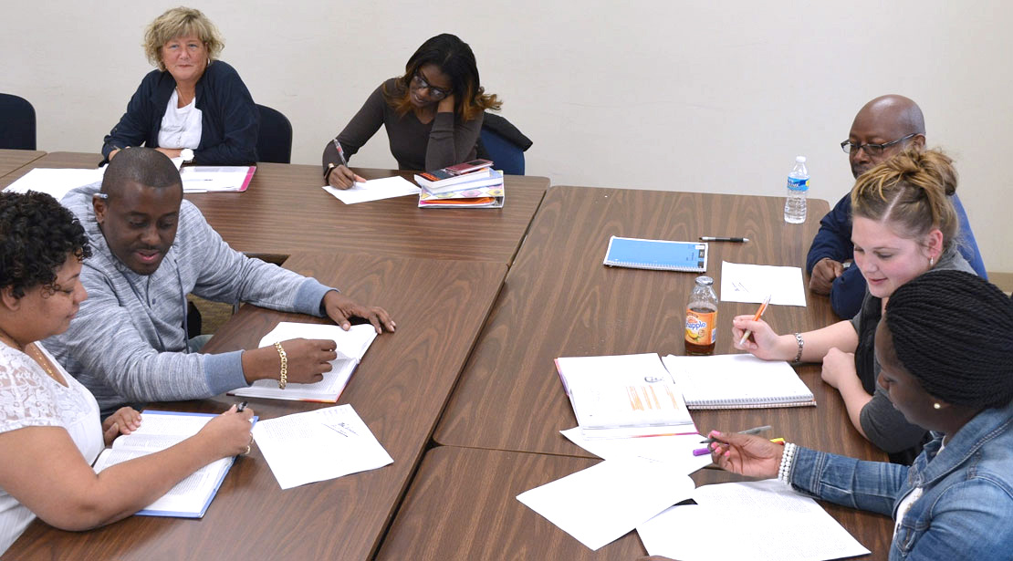 Groups of students completing in-class assignments.