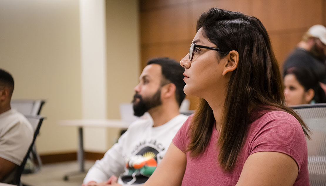 Students in classroom, listening