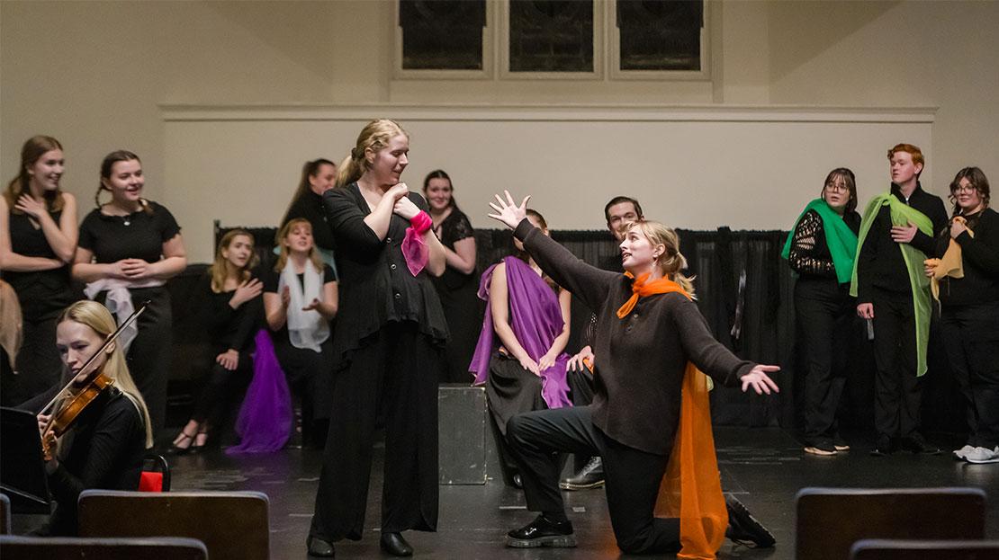 Student vocalists perform in a fully staged opera production.