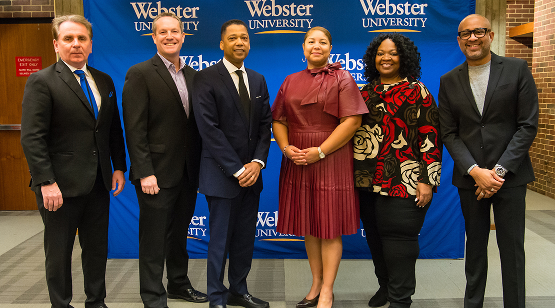 President Julian Schuster and Chief Diversity Officer Vincent Llewellyn stand with four conference speakers.