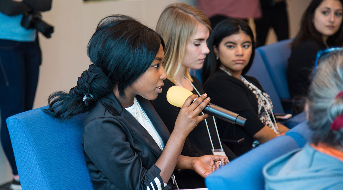 A student asking questions of the speaker