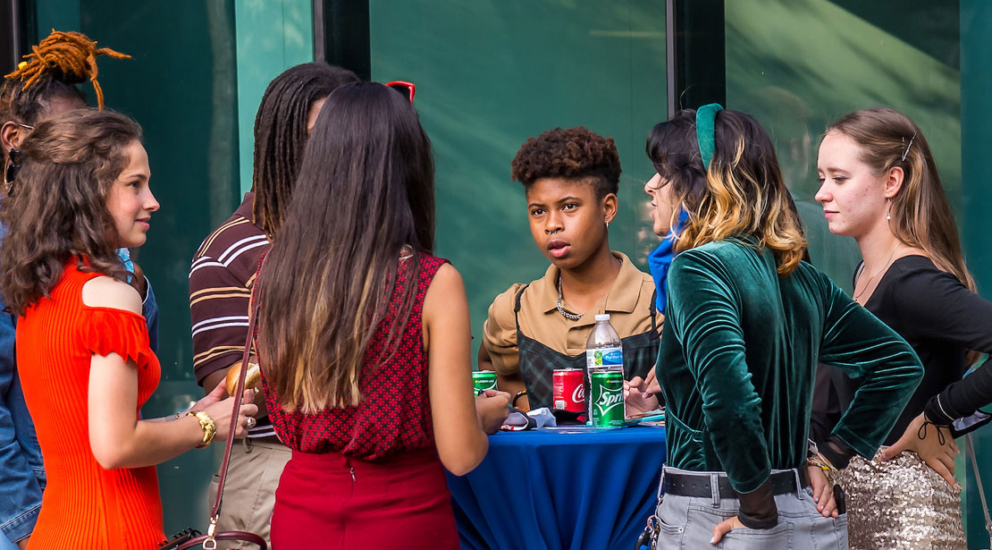 Honors College students socializing at an outdoor event
