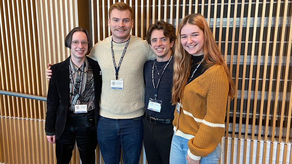 Group of four honors students posing together