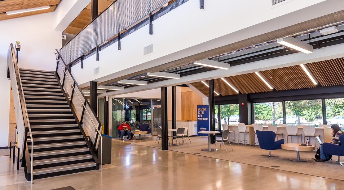 Media Commons main area with stairs to second floor