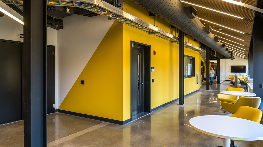 yellow and white student seating area