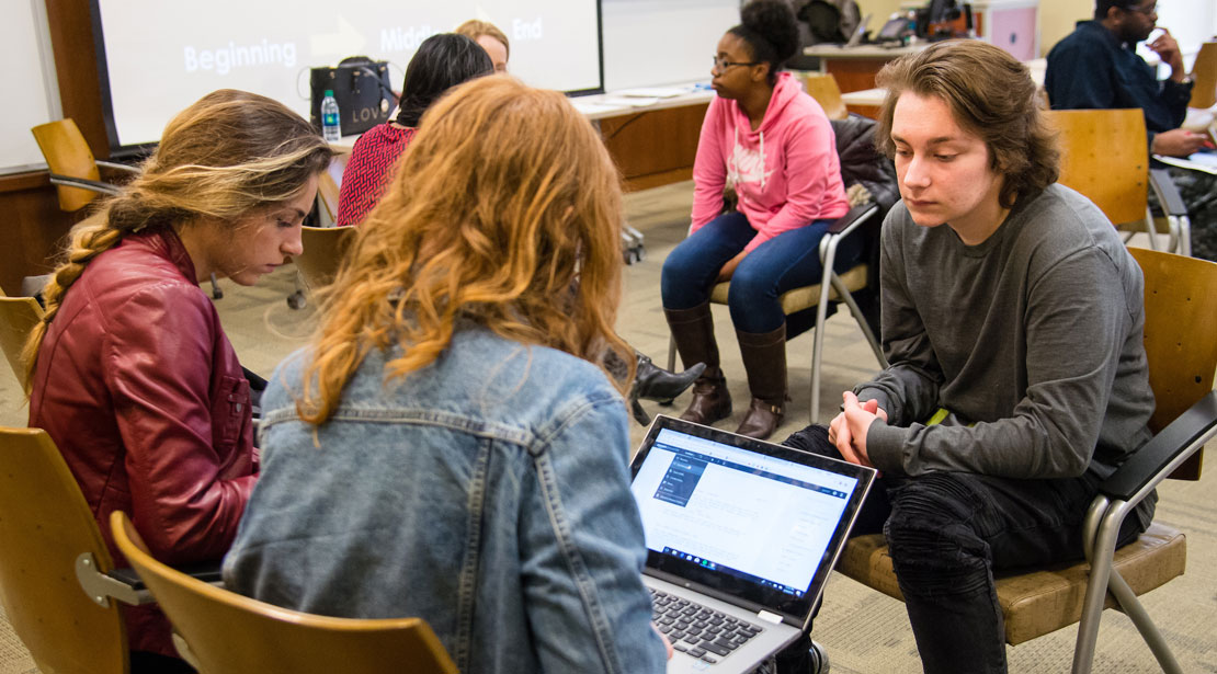 Students collaborating in class