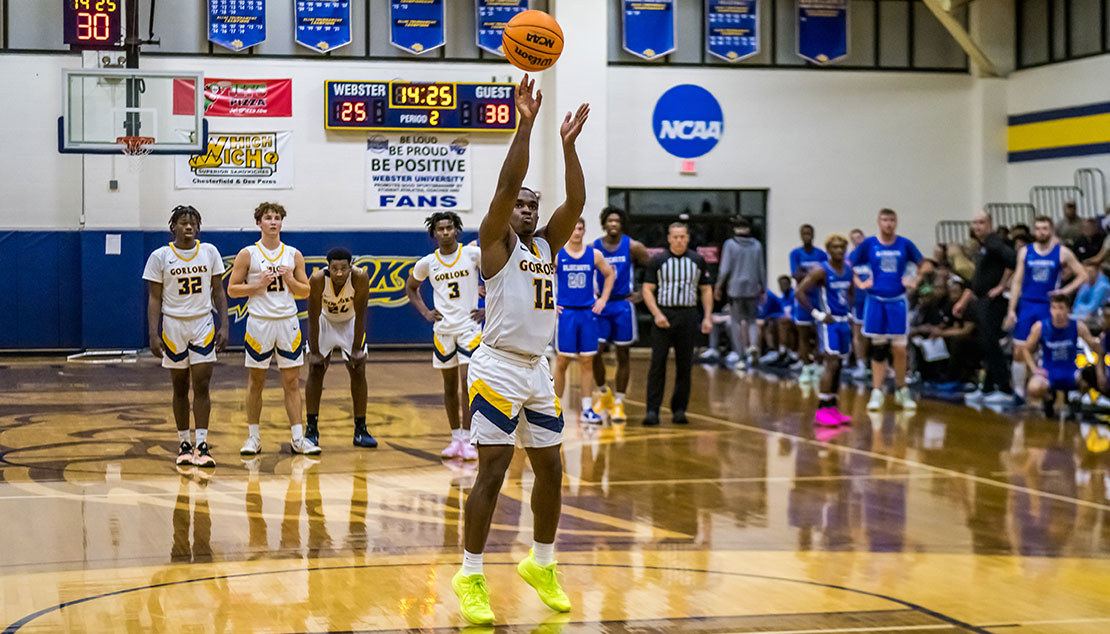 Men's basketball player taking a freethrow 