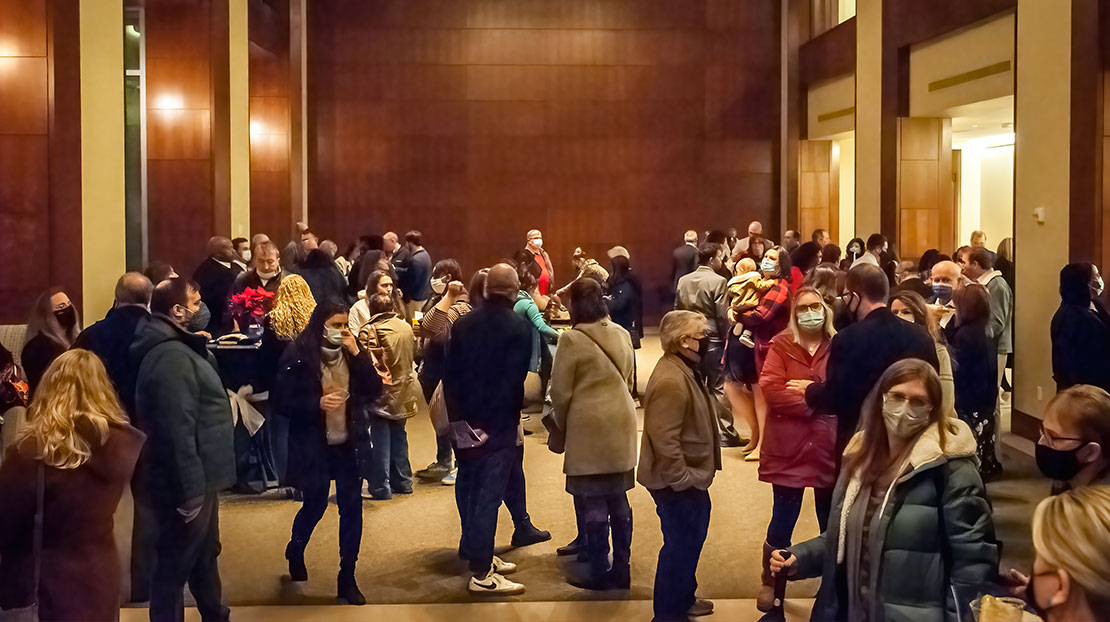 People gather in lobby to talk