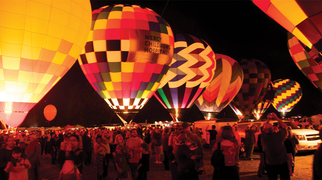 Several hot air balloons for the Balloon Race in Forest Park.