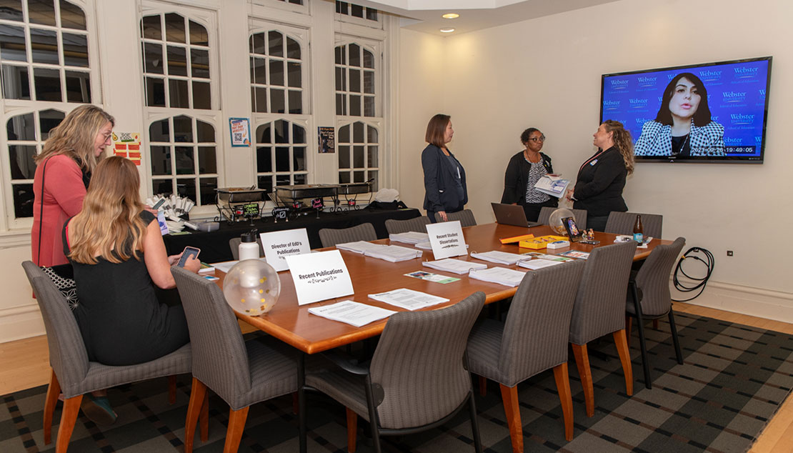 the conference room for the seo expo as attendees begin to gather. 