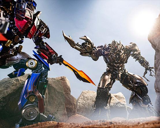 Transformers Optimus Prime and Megatron fight each other
