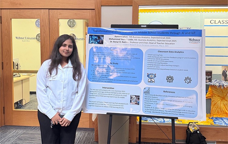 Aamera Jahan and the research project poster at the Research Across Disciple (RAD)