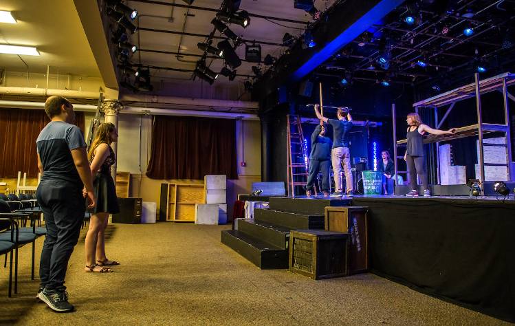 student rehearsal on stage