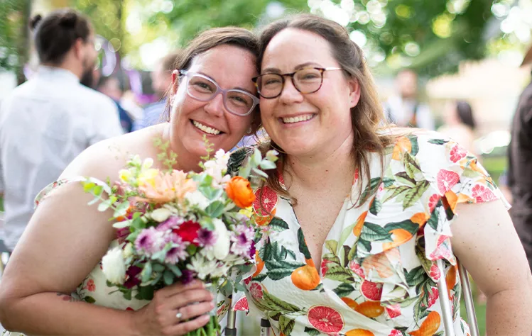 Alex Chrum, left, and her wife Whitney Hess