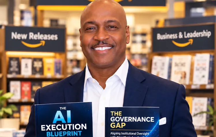 Samuel Brown holding his two published books