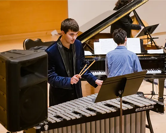 A student performs on vibraphone in a jazz ensemble.